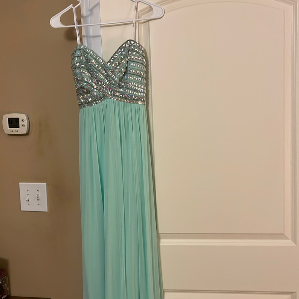 Mint green jeweled strapless prom dress